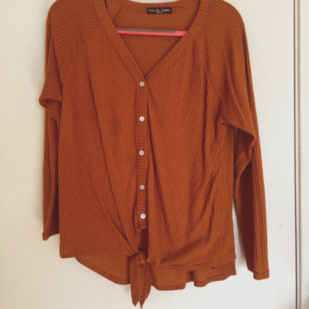 rust orange tie front sweater